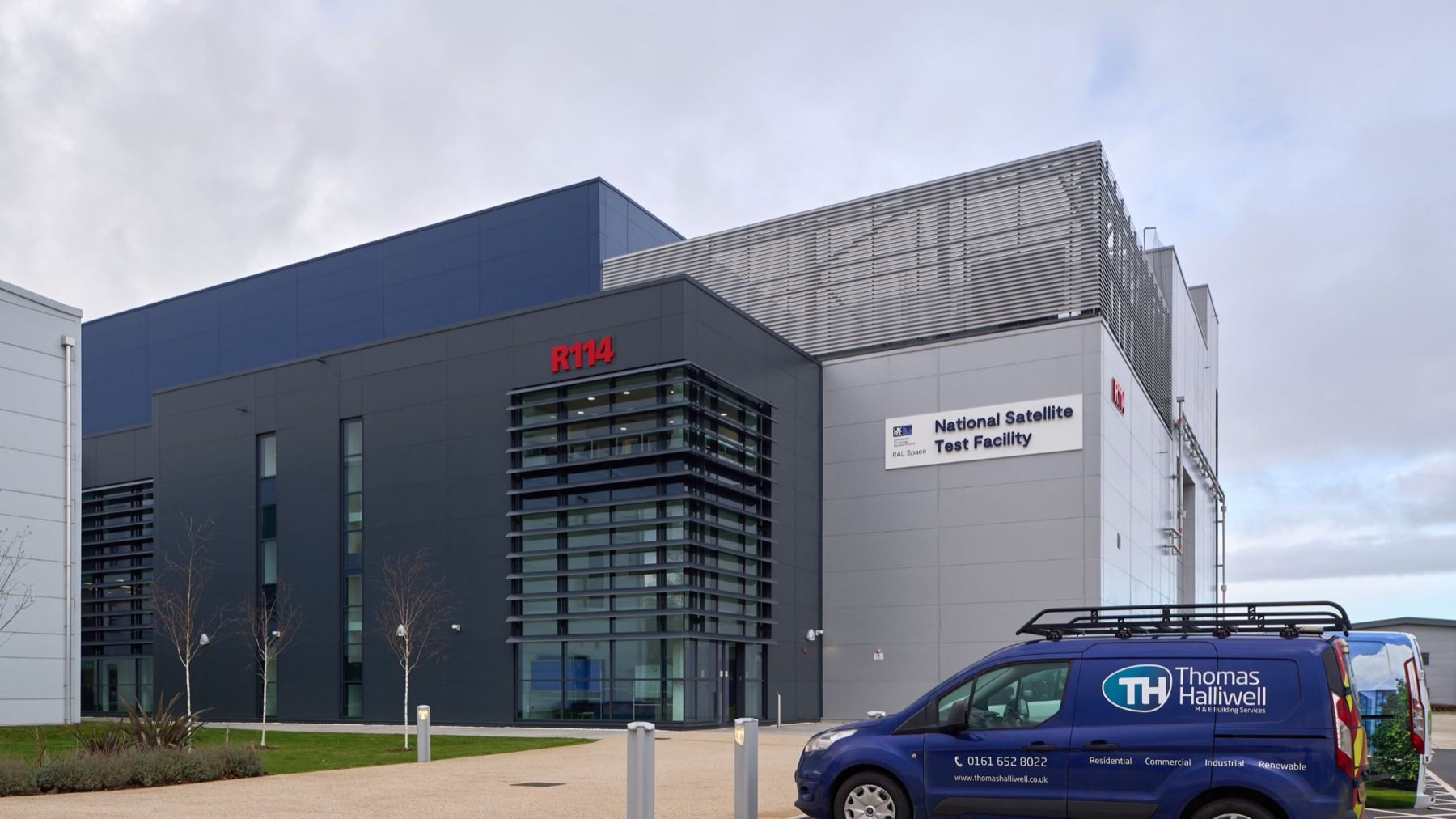 National Satellite Test Facility building at Harwell with a Thomas Halliwell van outside